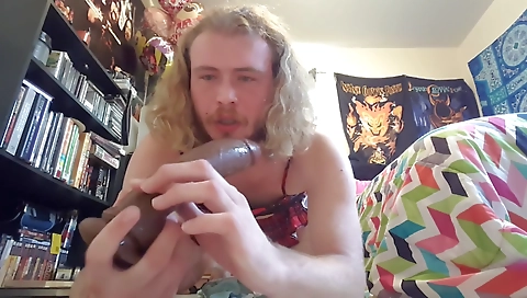 She gets fucked by a huge cock in her pussy