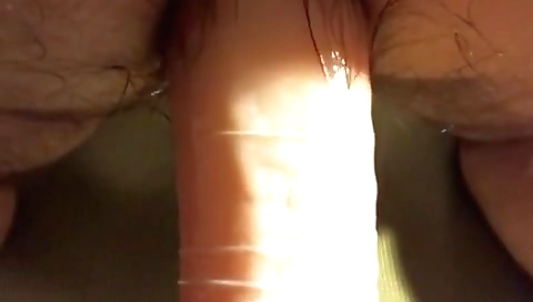 Sexy young chick fucked by a dildo