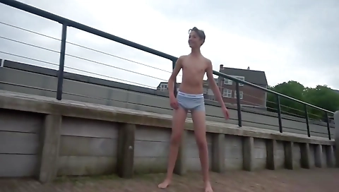 Sexy young blonde's cock in the park